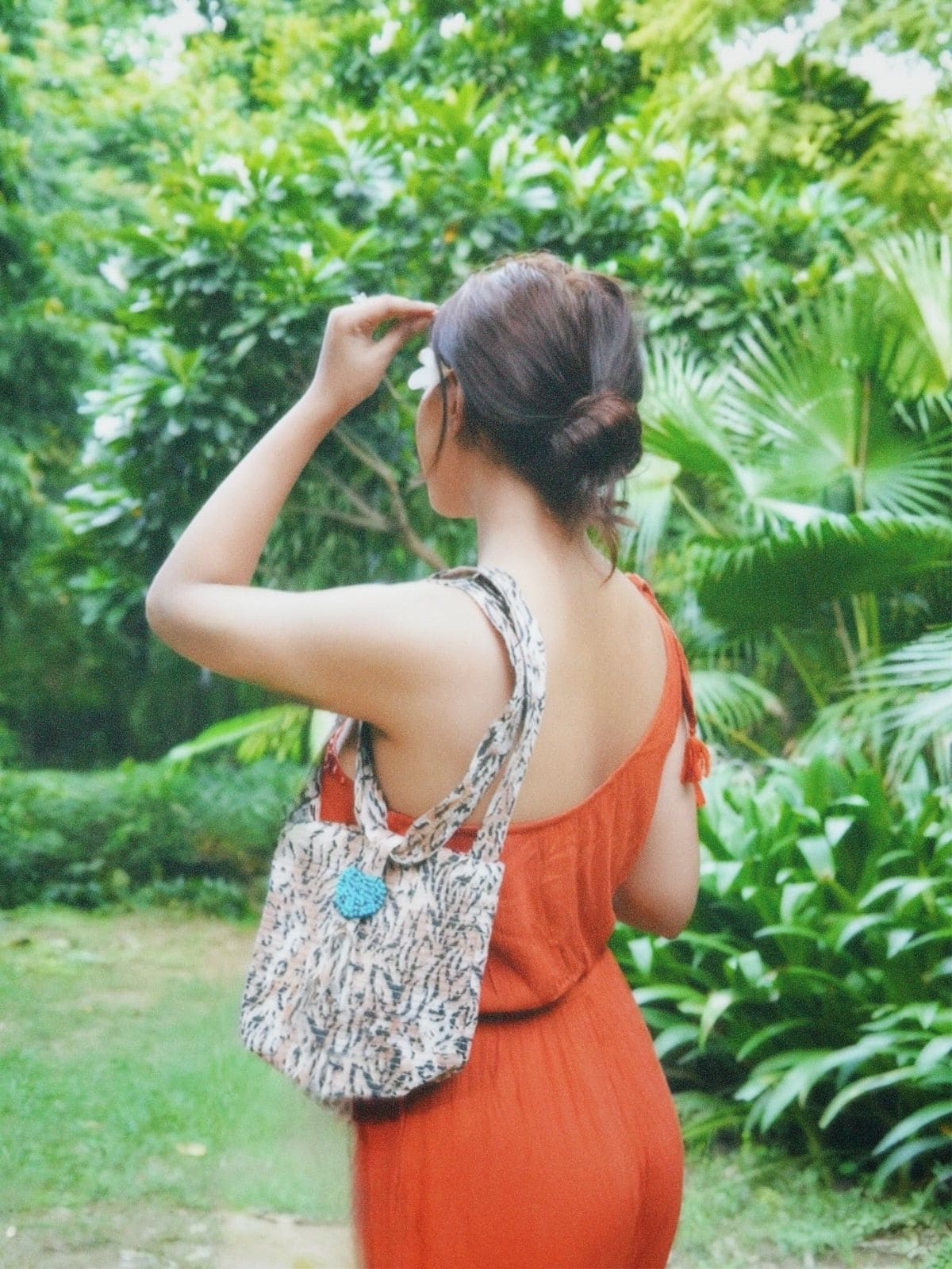 Urnisha in Orange shower jumpsuit