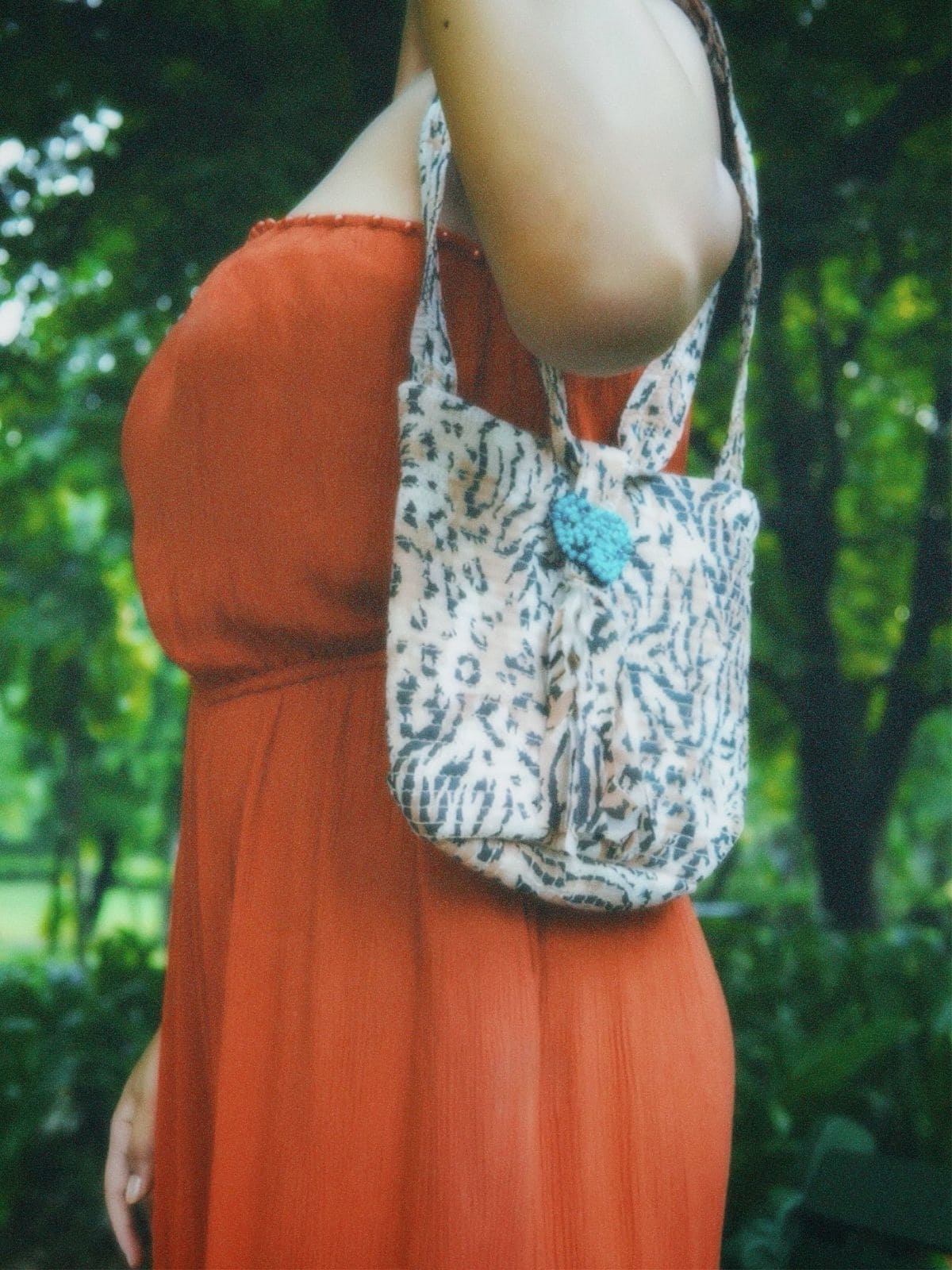 Urnisha in Orange shower jumpsuit