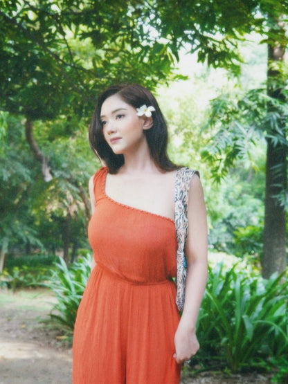 Urnisha in Orange shower jumpsuit