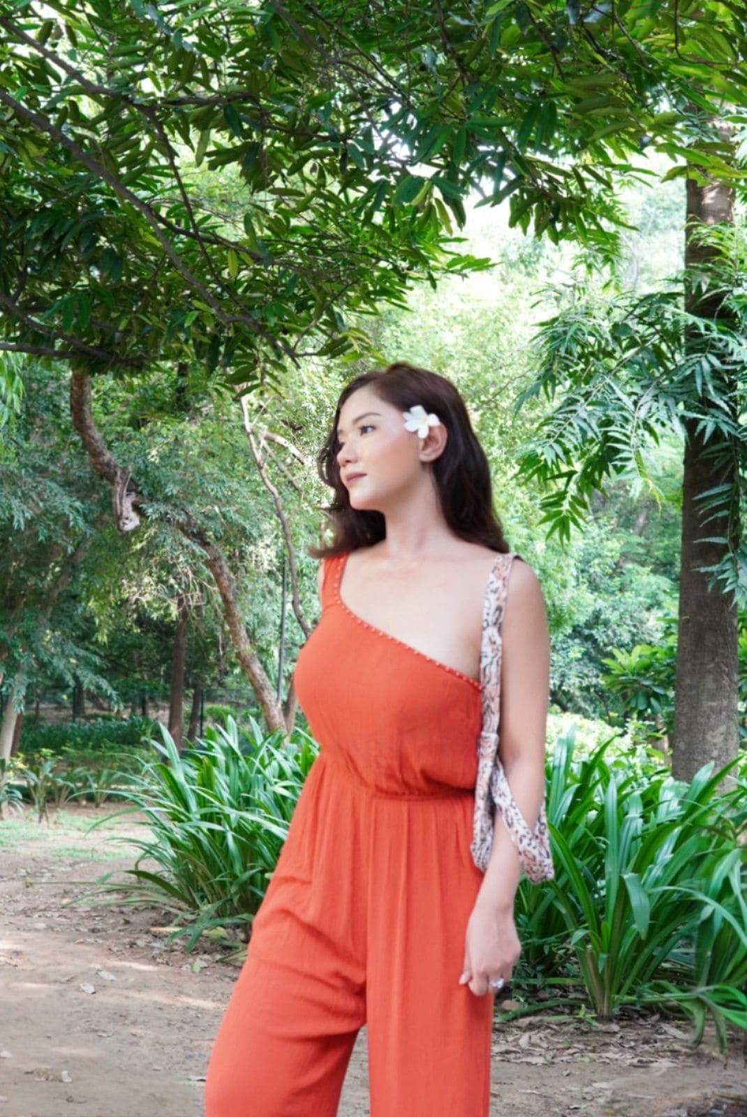 Urnisha in Orange shower jumpsuit